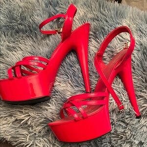 Vibrant Red Platform Heels
NWOT